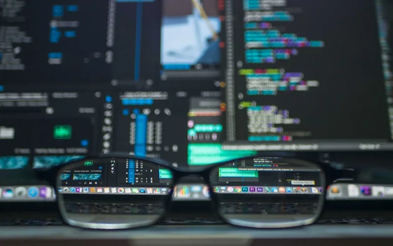 Developer workspace with AI coding assistant helping debug a complex application